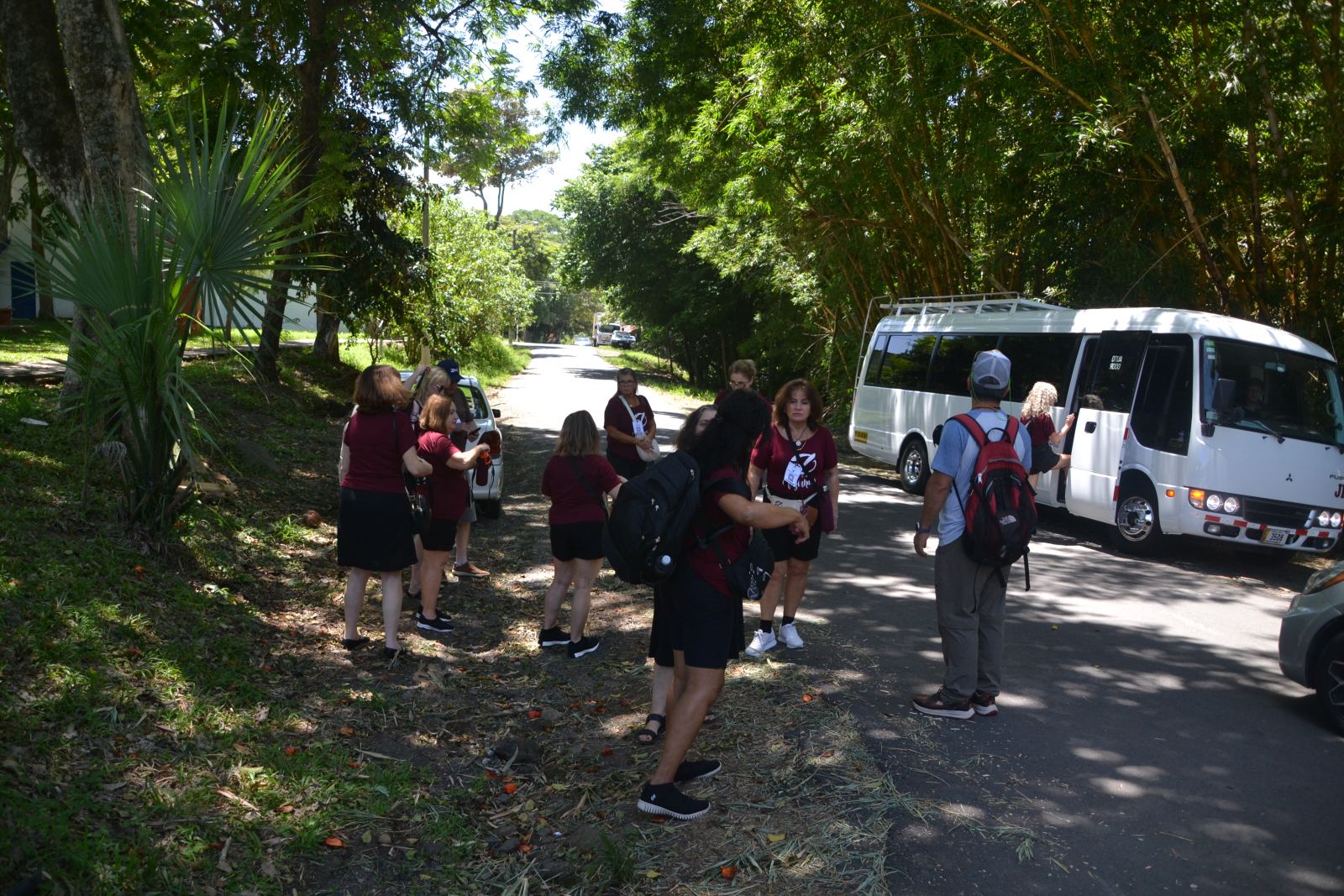 Choral Fest Costa Rica delegation beside the group bus during a visit to Atenas, Alajuela.
