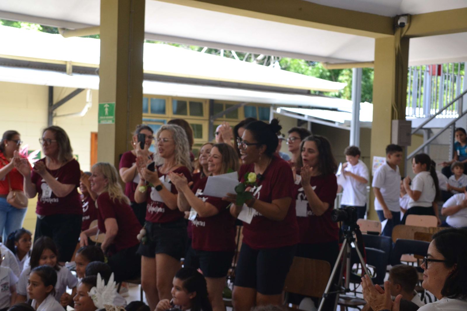 Choir applauding during a school ceremony at Choral Fest Costa Rica for Peace.