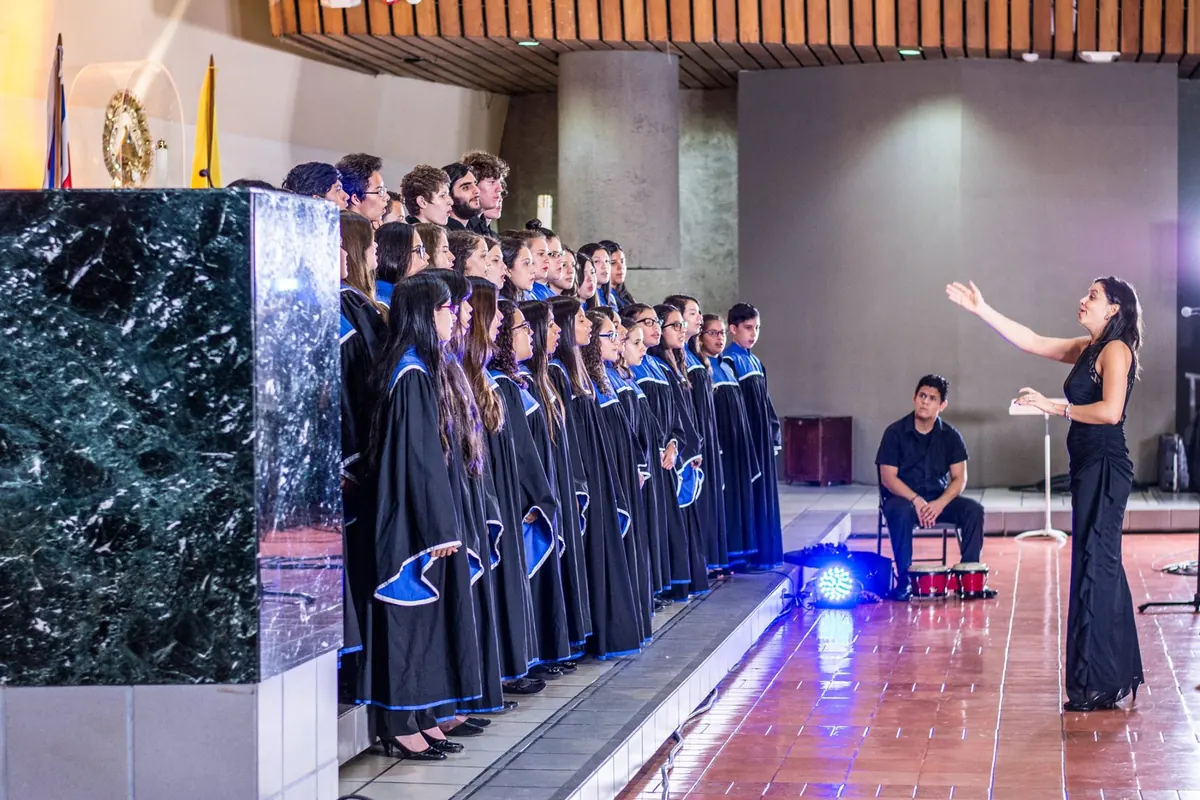 Choir performing with a conductor during Choral Fest Costa Rica for Peace.