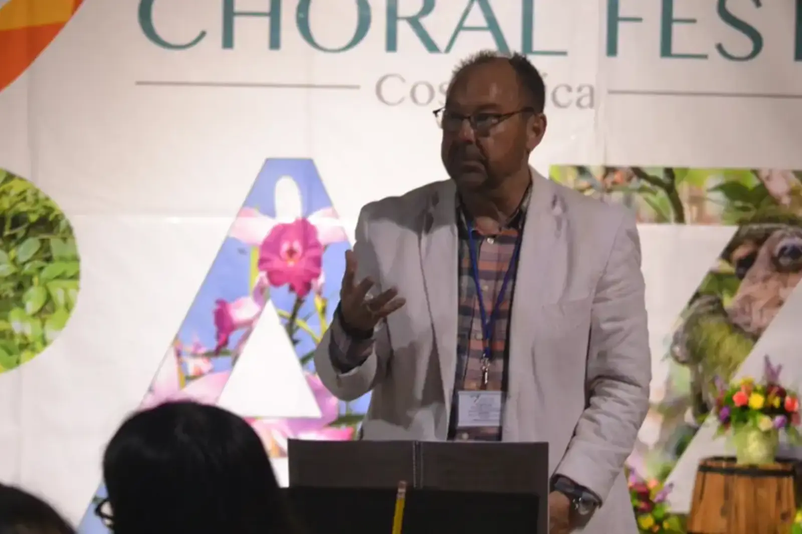 Choir director presenting during the International Choral Festival Costa Rica for Peace